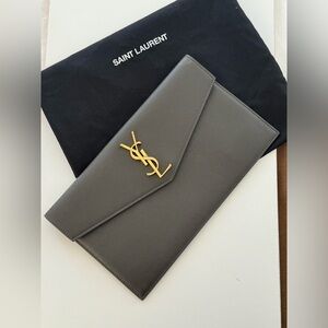 SAINT LAURENT
Uptown textured-leather pouch